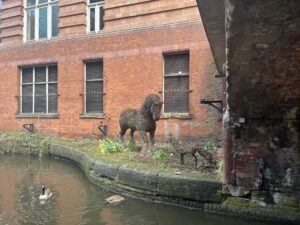 Waterside art by the Rochdale Canal. A life-sized horse and fox.